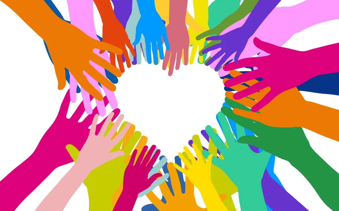 bunte Hände bilden Herz